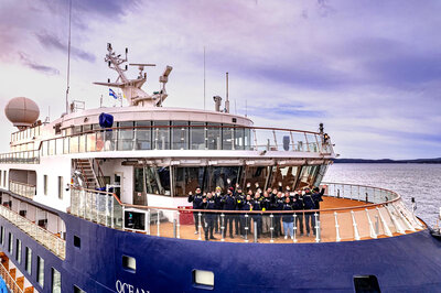 The 'Ocean Victory' and her expedition team, photo by Albatros Expeditions.
