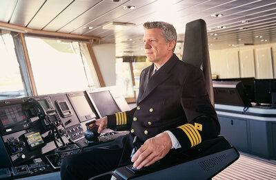 Captain Martin Graser on the bridge. Photo: Lindblad Expeditions.