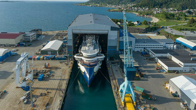 After months out of sight in the dock hall at Ulstein Verft, Norway, the 126-passenger expedition cruise vessel ‘National Geographic Resolution’ for Lindblad Expeditions was docked out on 8th June 2021. Photo: Ulstein Group/Per Eide Studio