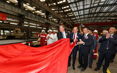 Commercial director in Ulstein Design & Solutions, Lars Ståle Skoge (left), at the steel cutting ceremony on the Ocean Explorer.