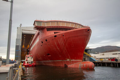 Docking completed, and the tug about to depart.