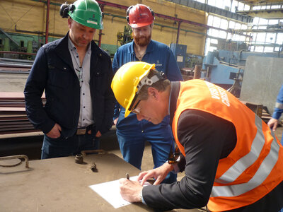 SVP Marine & Technical at Color Line, Jan Helge Pile, signing the official papers.
