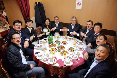 Ulstein and yard representatives celebrating the expedition cruise ship contract.