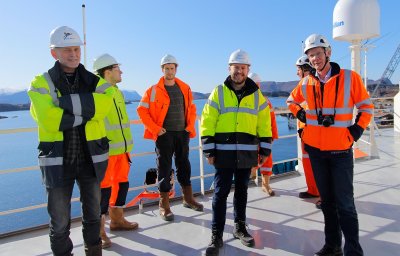 Acta Marine representatives and crew eagerly awaiting the change of flags. Rob Boer to the right.